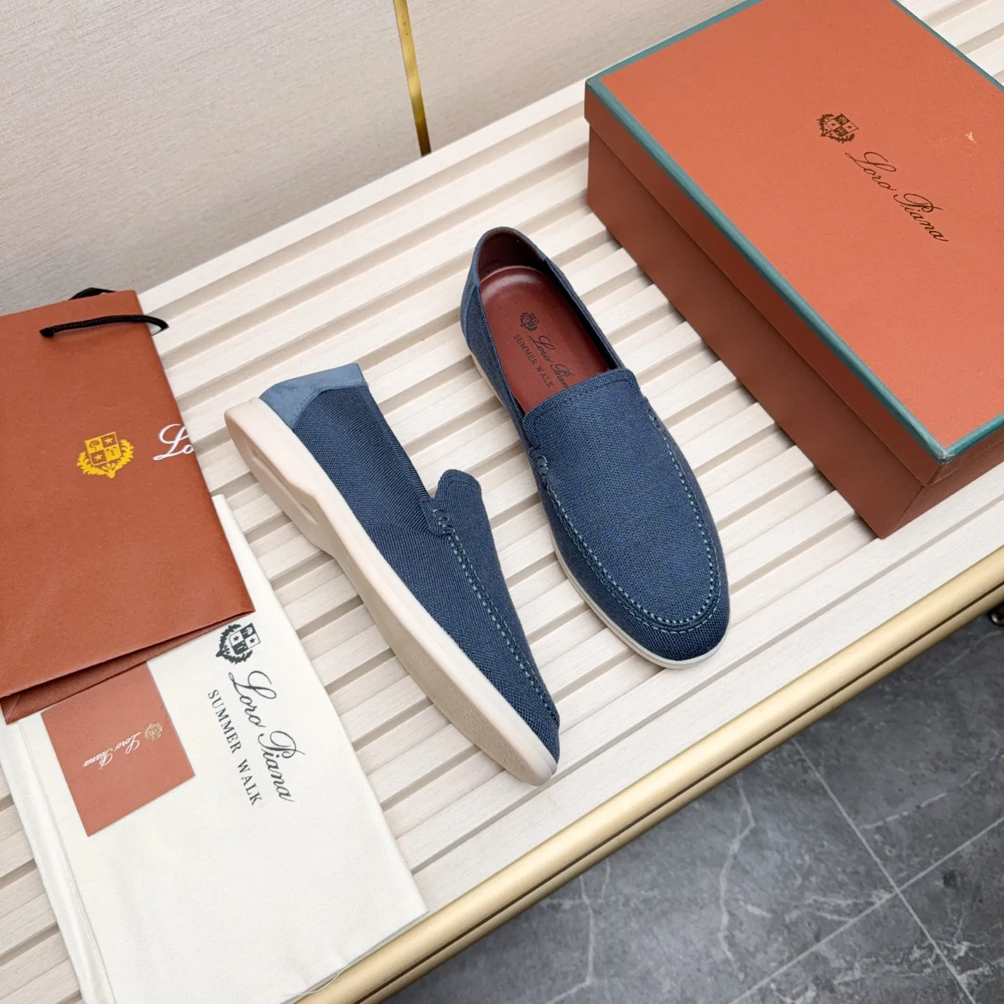 Men's Men's Shoes 💰400 Loro PIana moccasins are made of wish wool fabric. The upper is made of knitted fabric, made on a loom, and then attached to a rubber sole. The Rain System's water-repellent treatment enhances the shoe's functional design, while the suede details give the shoe a sense of elegance and sophistication. Made from Wish, fine wool from Australian and New Zealand Merino sheep